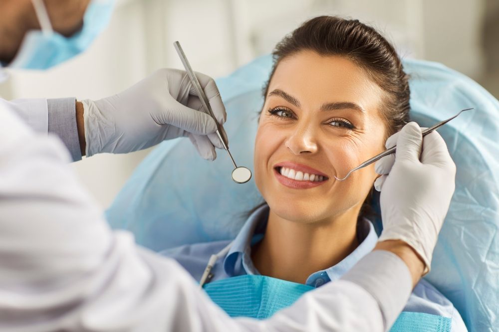 10 Signs It's Time to Visit a Dentist — And What to Expect When You Do